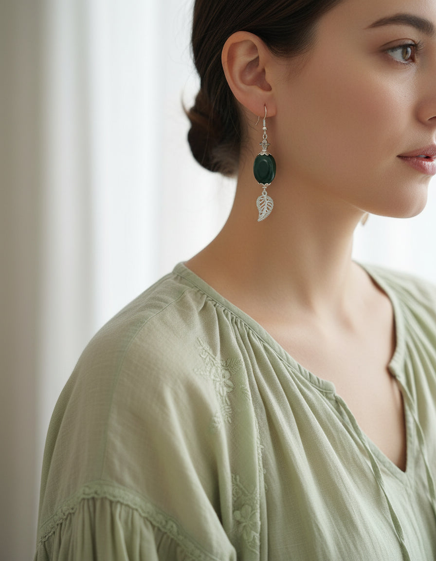 Deep green gemstone silvery shiny leaf earrings