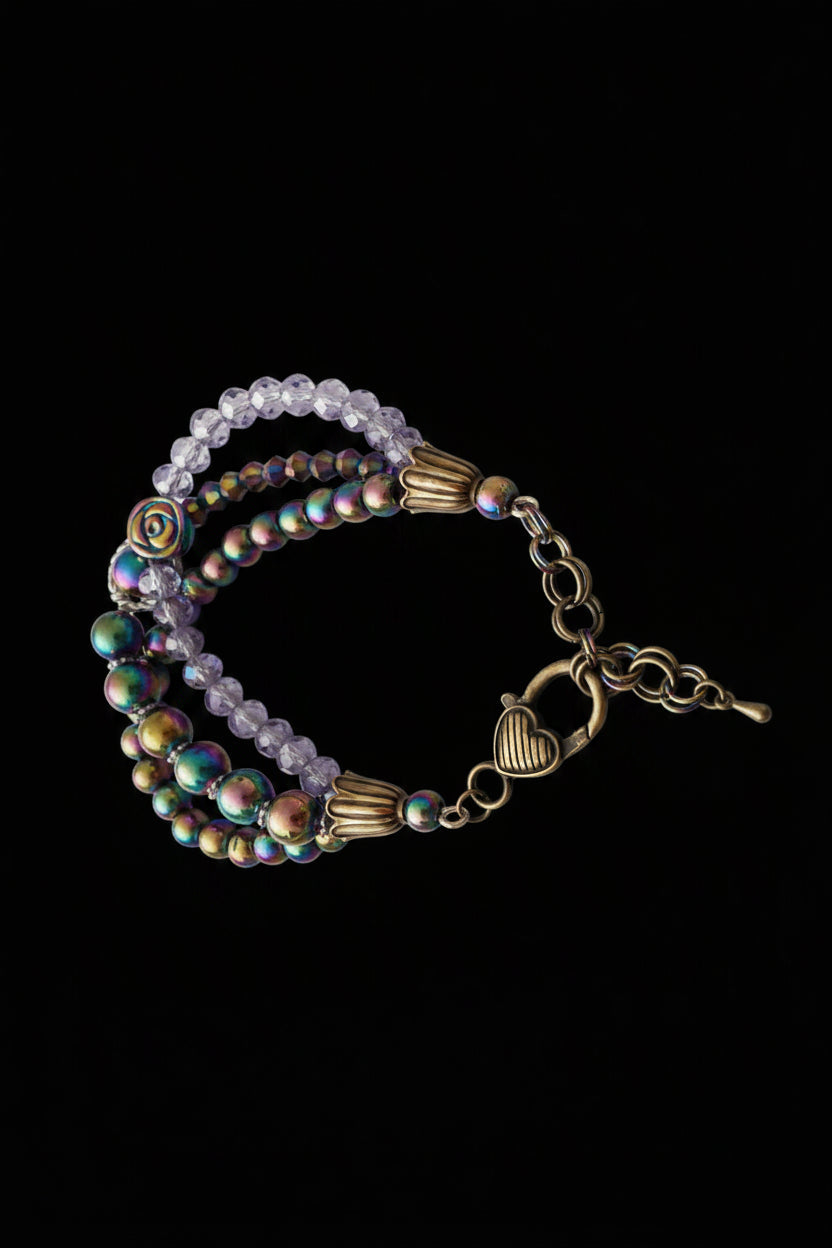 Multicolored beaded bracelet with a clasp on a white background