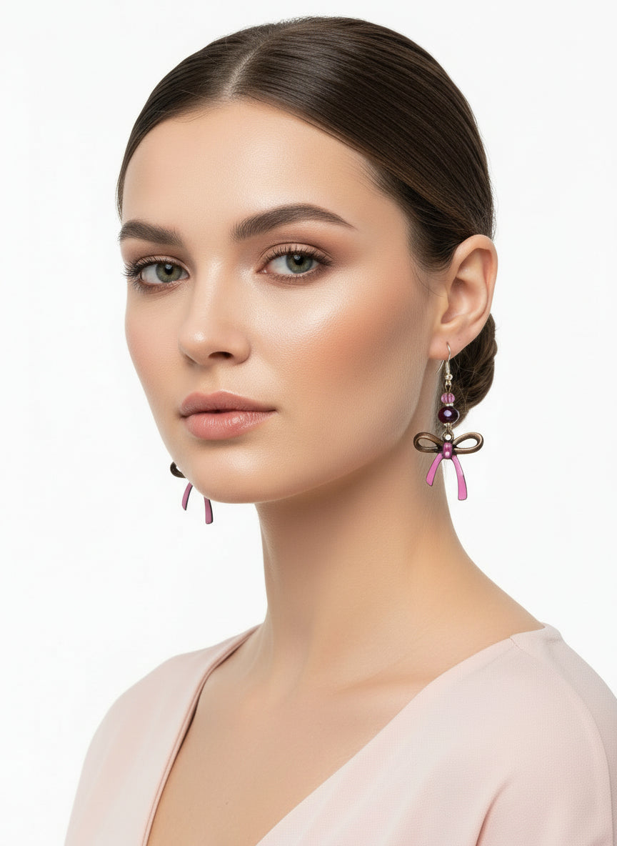 Pink and bronze bow earrings with Glass beads 2.25inches