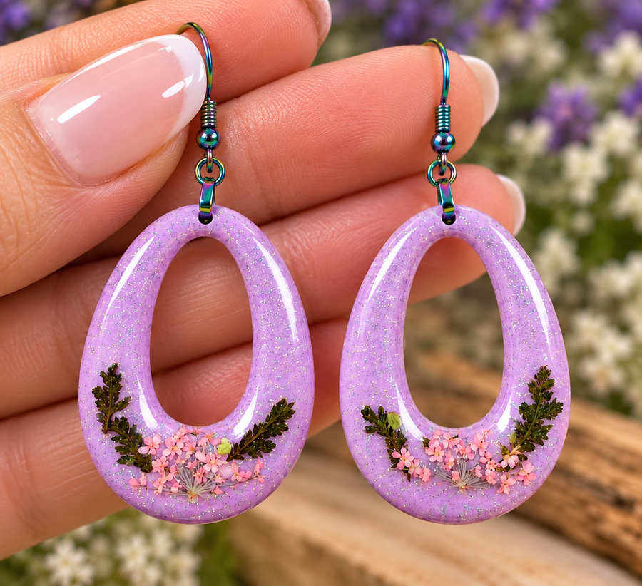 Lavender oval hoop earrings with tiny pink dried flowers