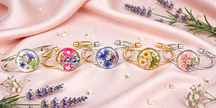 Handmade adjustable metal cuff bracelets with floral resin cabochons