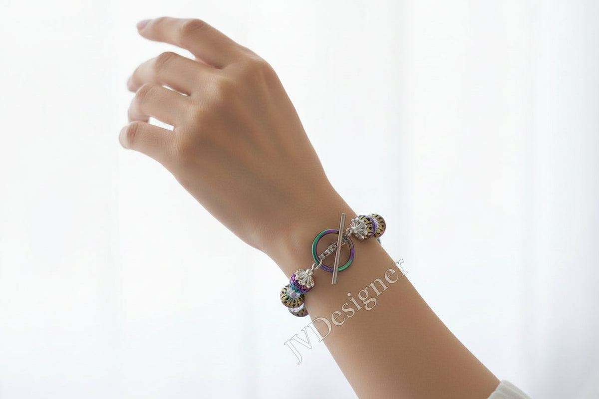 Multicolored beaded bracelet on a piece of lined paper
