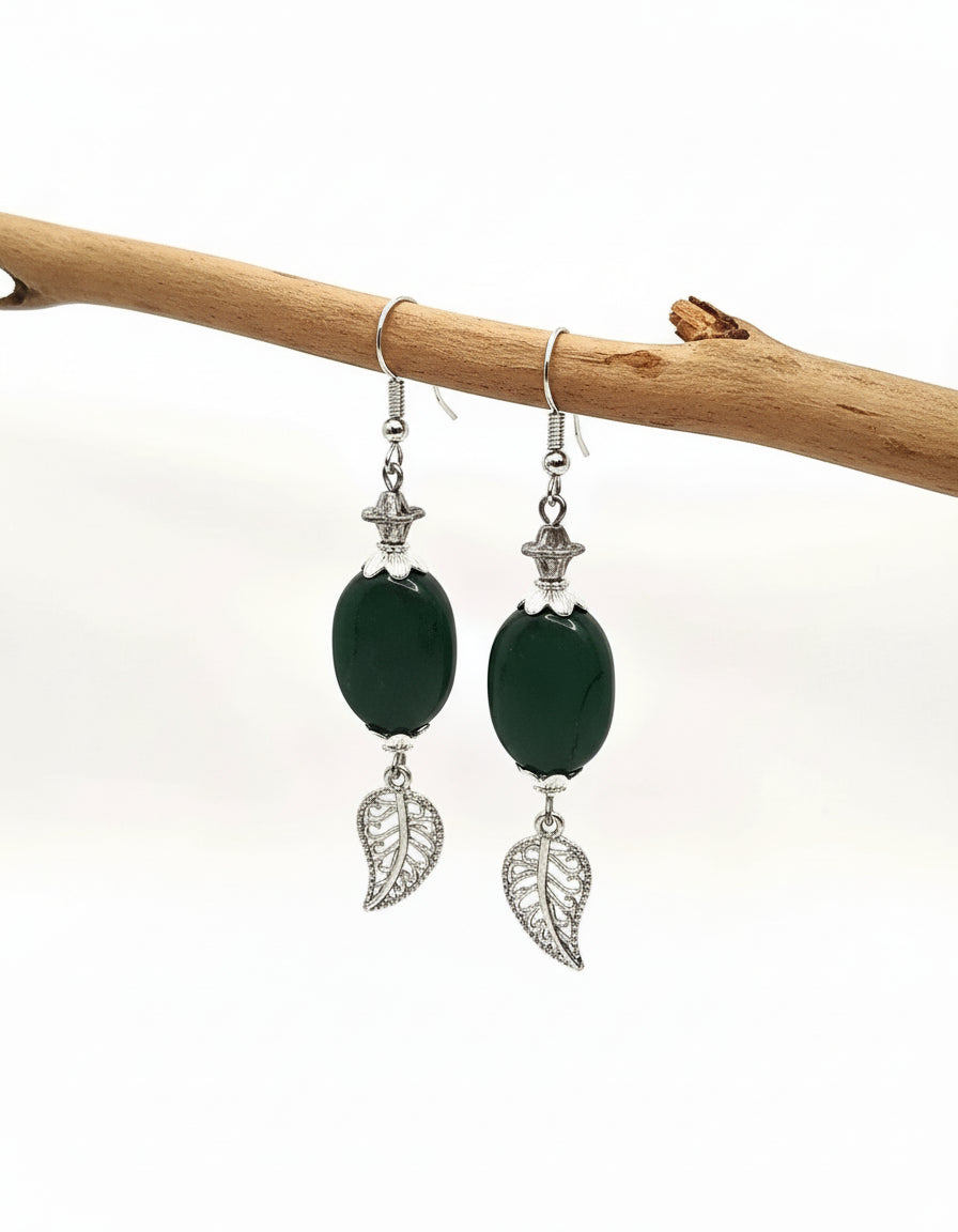 Deep green gemstone silvery shiny leaf earrings