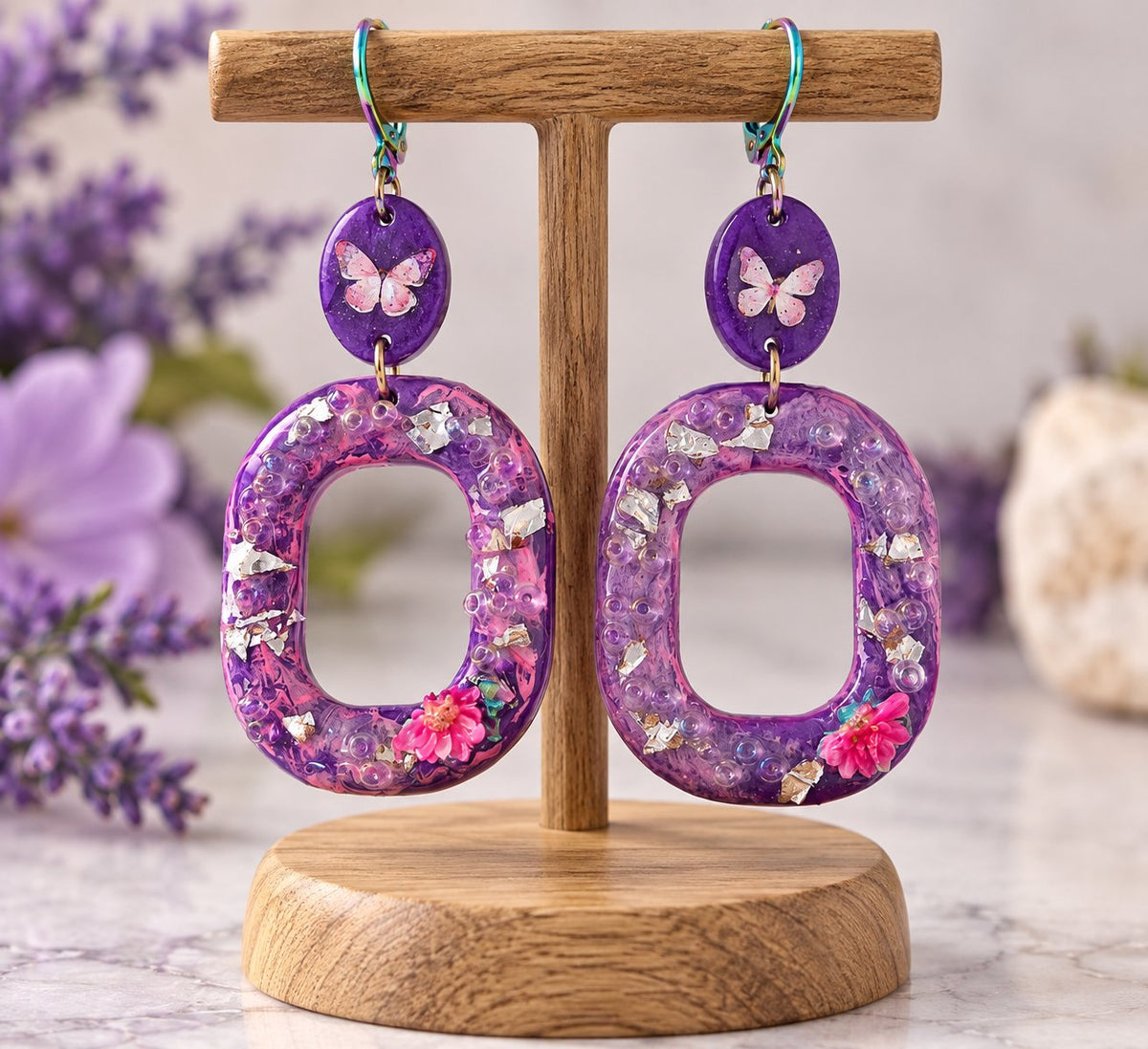 Purple Butterfly Resin Hoop Earrings - purple resin hoops with pink dried flowers, butterfly tops, rainbow leverbacks