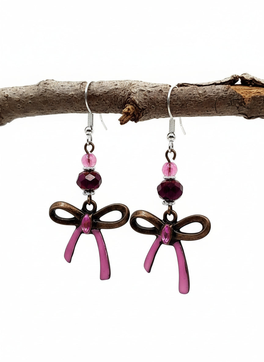 Pink and bronze bow earrings with Glass beads 2.25inches