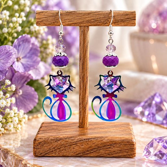 Purple ion plating cat earrings with crystal star on wooden display stand