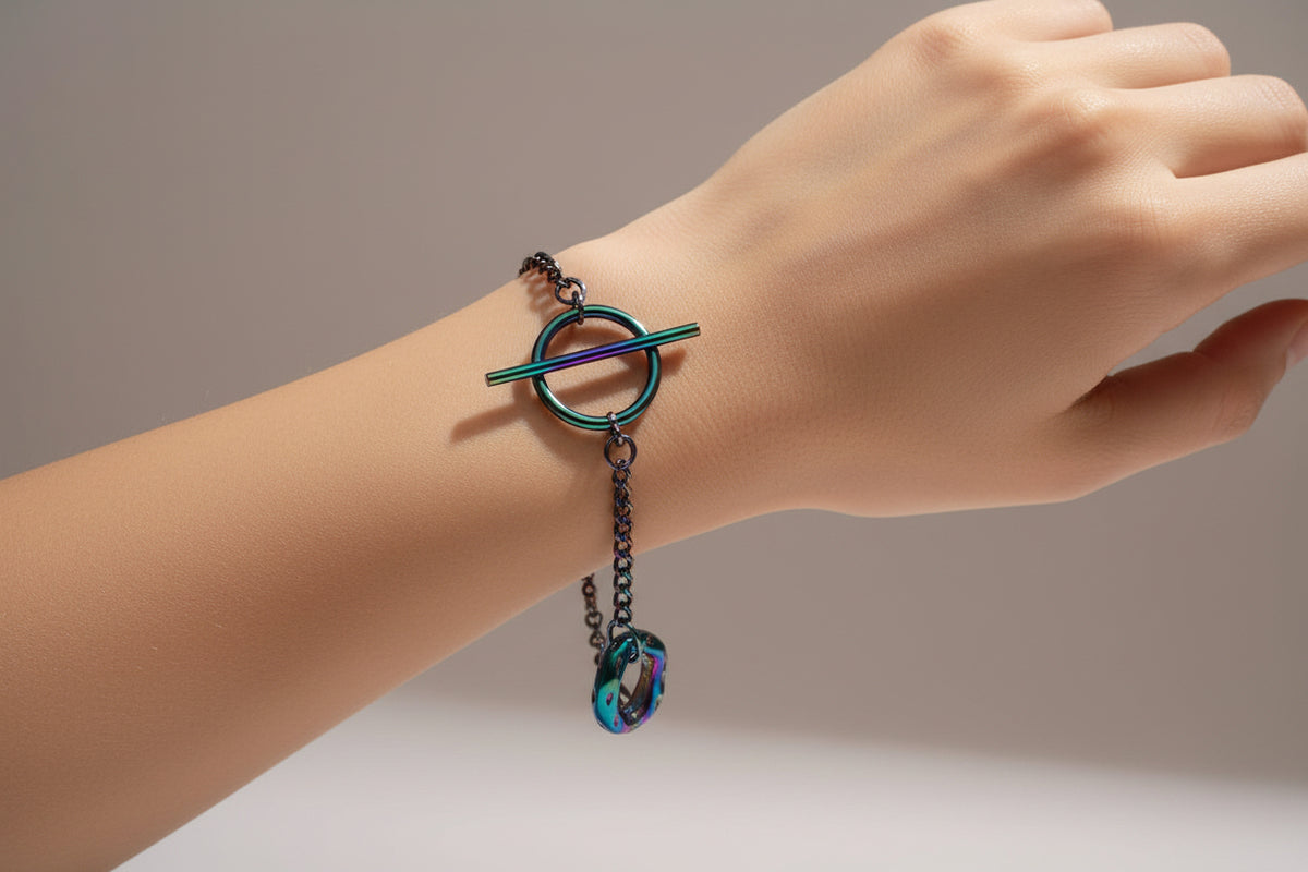 Multicolored chain bracelet on a light gray background