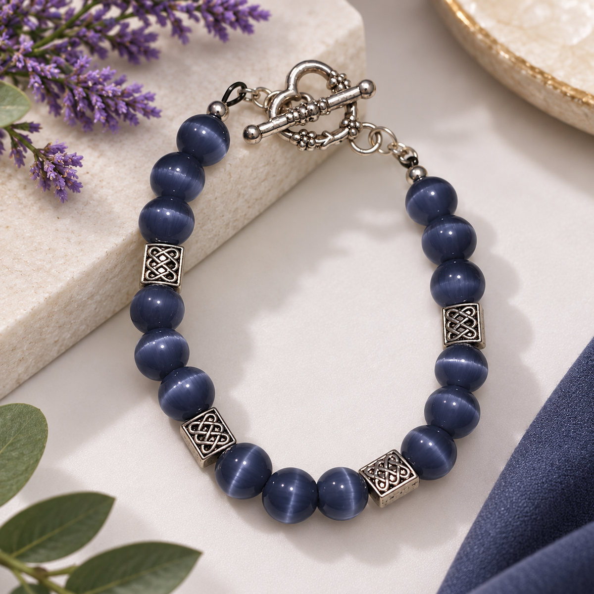 Purple and blue cat eye stretch bracelet with silver heart toggle clasp