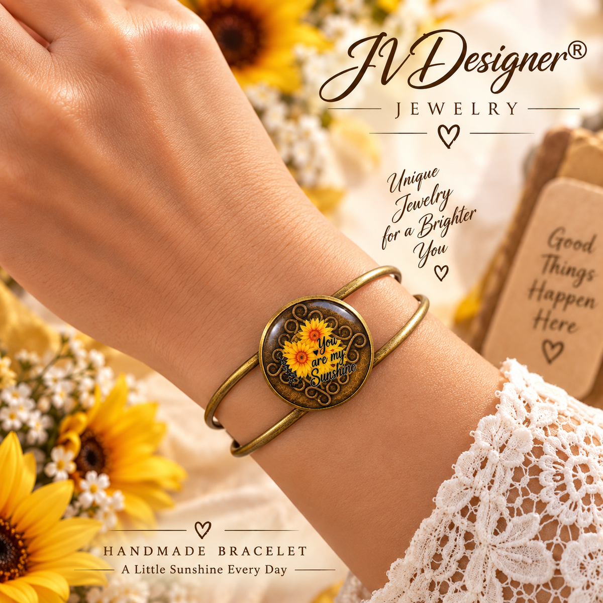 Antique bronze resin bracelet with sunflower cabochon worn on wrist, close-up view