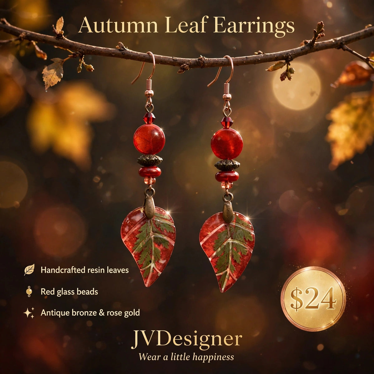 Handcrafted resin leaf earrings with red glass beads and antique bronze rose gold hooks, hanging from a tree branch with autumn leaves and warm bokeh in the background. Text overlays read 'Autumn Leaf Earrings' and 'JVDesigner'.