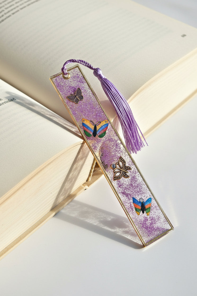 Decorative bookmark with butterflies and a tassel on a white background