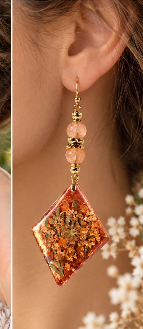 Close-up of the amber dried-flower resin diamond pendant earring with antique gold beads